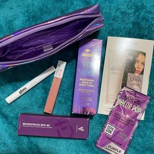 Makeup bag with Younique mascara and samples